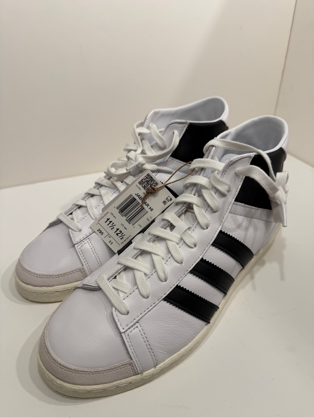 adidas White and Black Mid-Top Sneakers with Three Stripes
